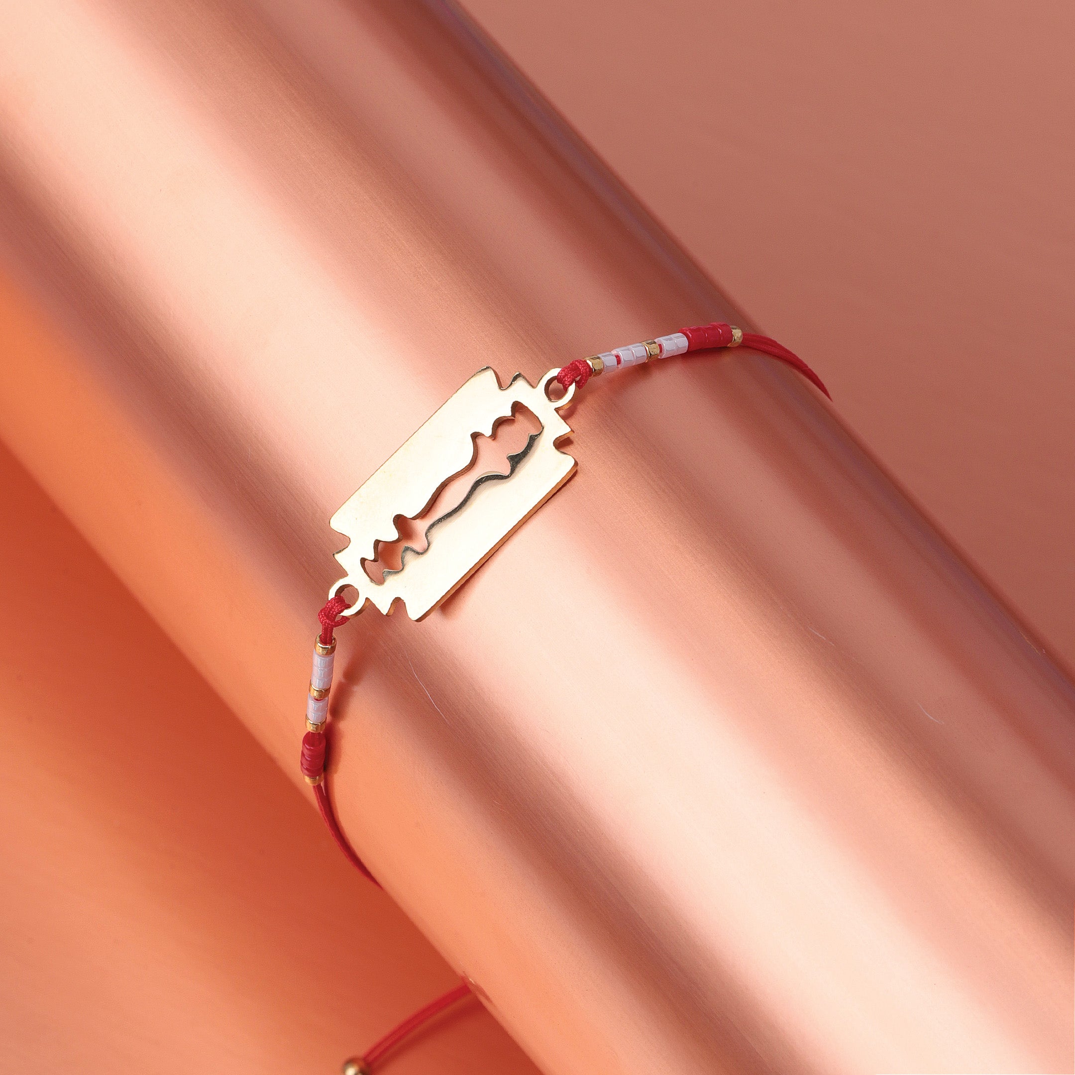 Razor Charm Red Braided Bracelet